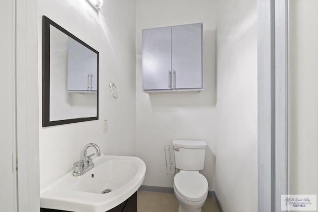 bathroom with sink and toilet