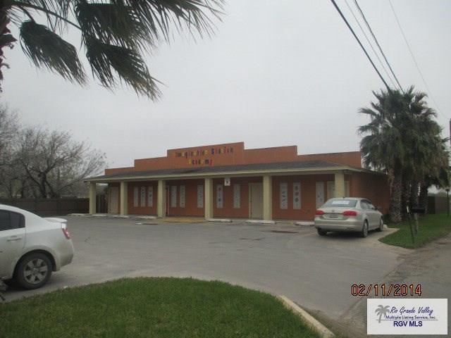 2100 Old Port Isabel Rd, Brownsville, TX 78526 - view of front of property featuring uncovered parking