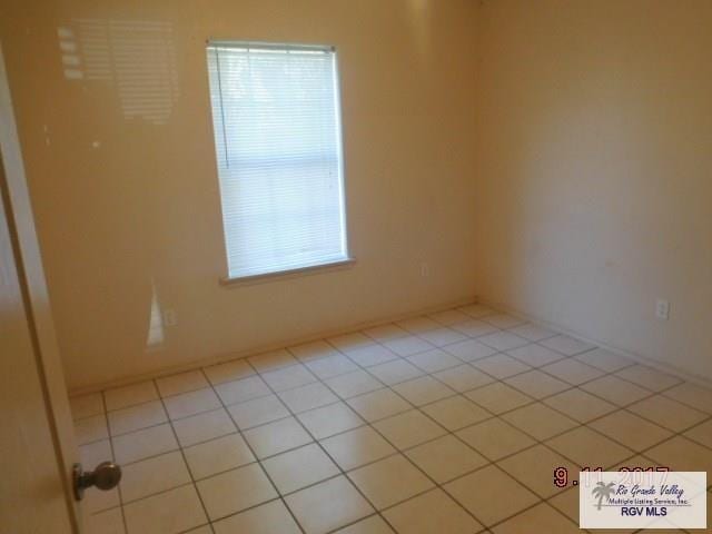 2100 Old Port Isabel Rd, Brownsville, TX 78526 - unfurnished room with light tile patterned flooring