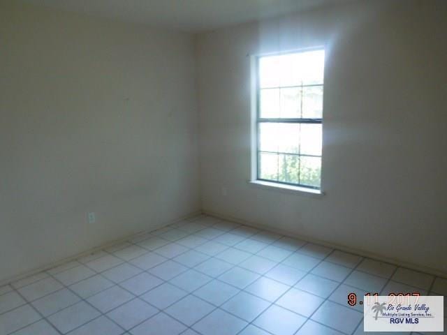 2100 Old Port Isabel Rd, Brownsville, TX 78526 - spare room with light tile patterned floors