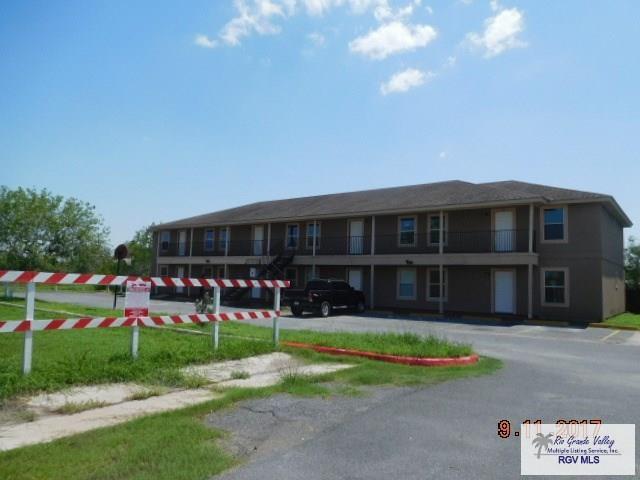 2100 Old Port Isabel Rd, Brownsville, TX 78526 - view of property featuring uncovered parking