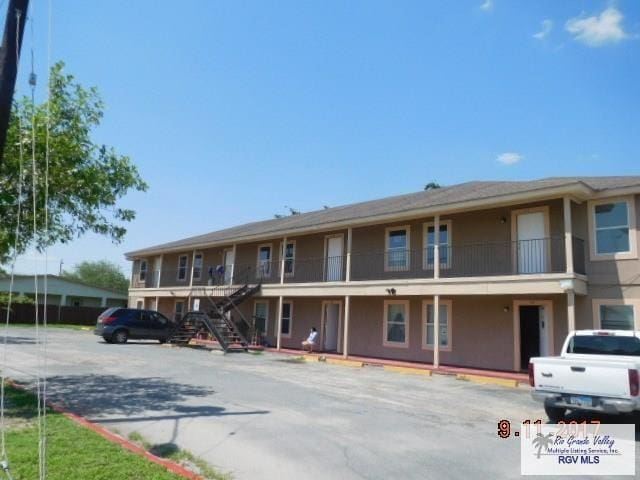2100 Old Port Isabel Rd, Brownsville, TX 78526 - view of property featuring uncovered parking