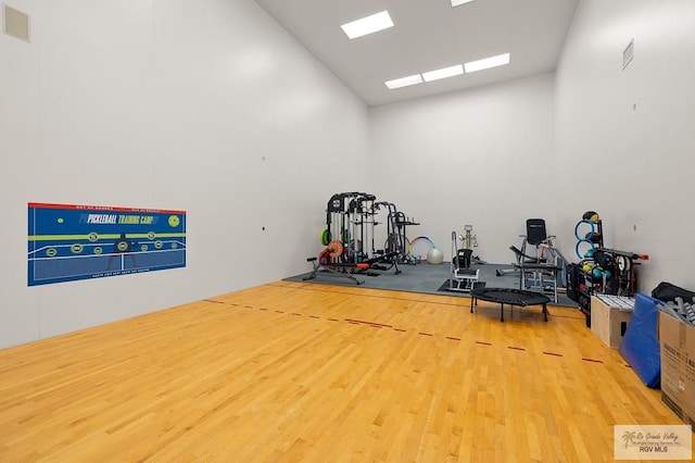 16408 Garrett Rd, Harlingen, TX 78552 - miscellaneous room featuring high vaulted ceiling and wood finished floors