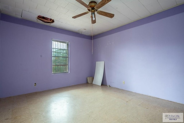 empty room featuring ceiling fan