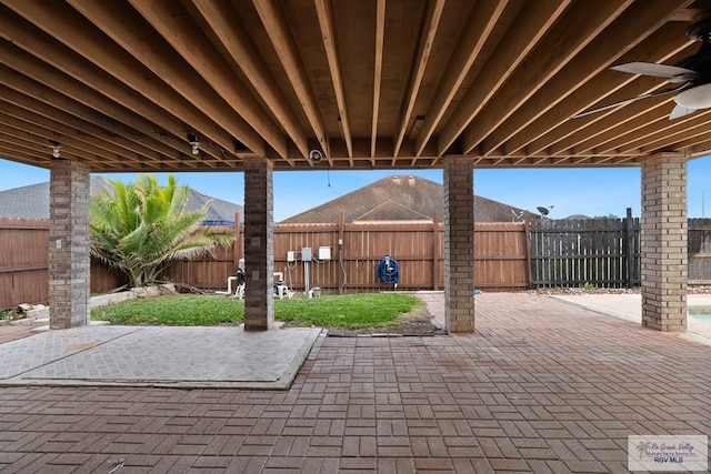 view of patio / terrace featuring ceiling fan