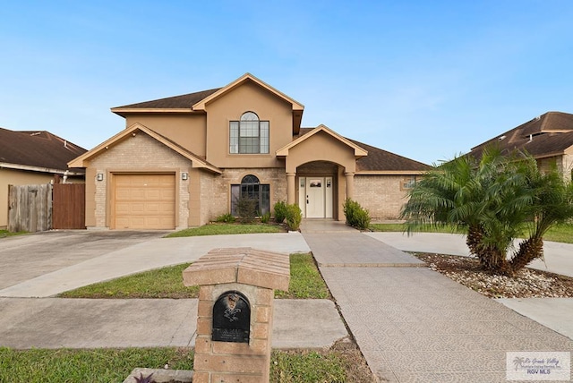 view of front of property with a garage