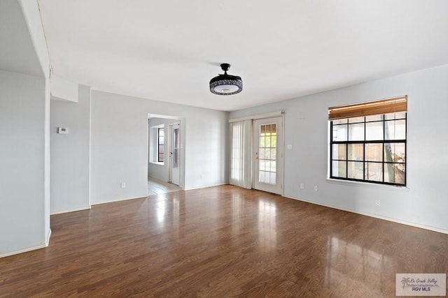 empty room featuring hardwood / wood-style floors