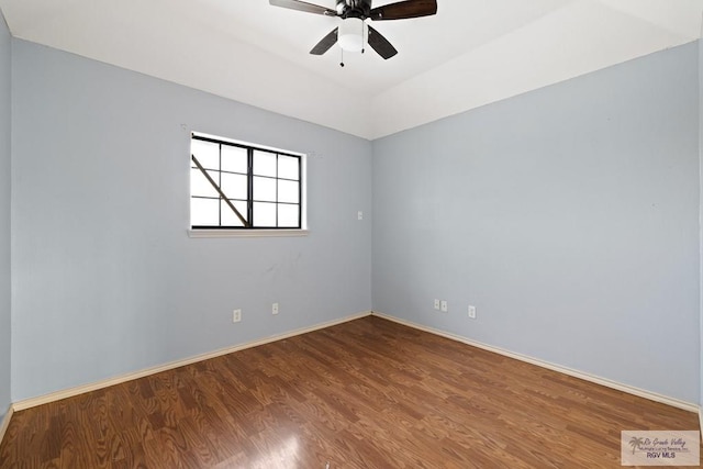 empty room featuring ceiling fan and wood-type flooring