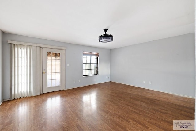 empty room featuring hardwood / wood-style floors