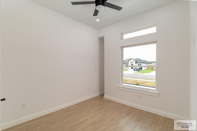660 Tamarindo Ln Unit 2, Brownsville, TX 78521 - unfurnished room featuring light wood-style flooring, ceiling fan, and recessed lighting