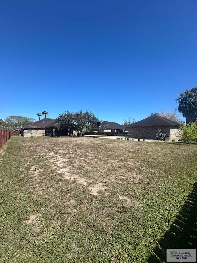 view of yard with fence