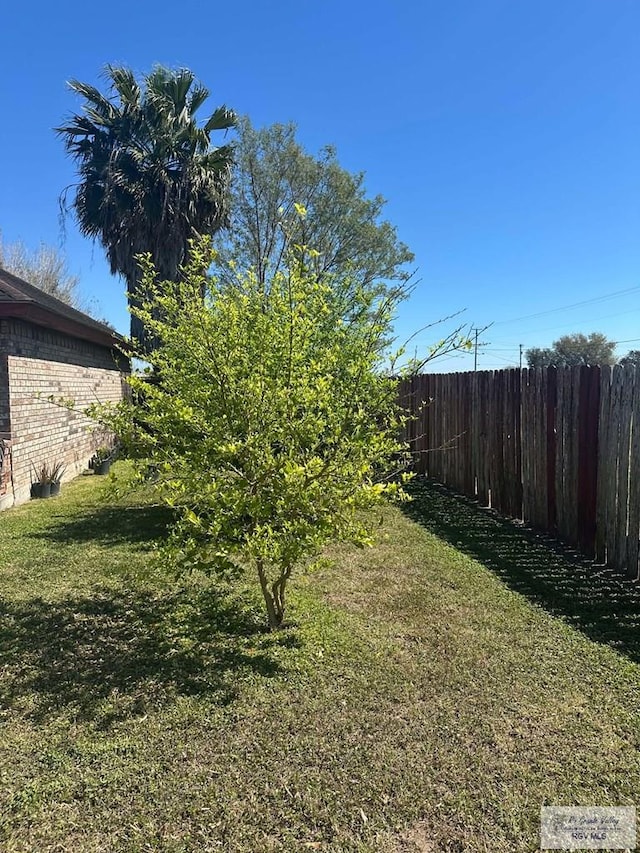 view of yard with fence