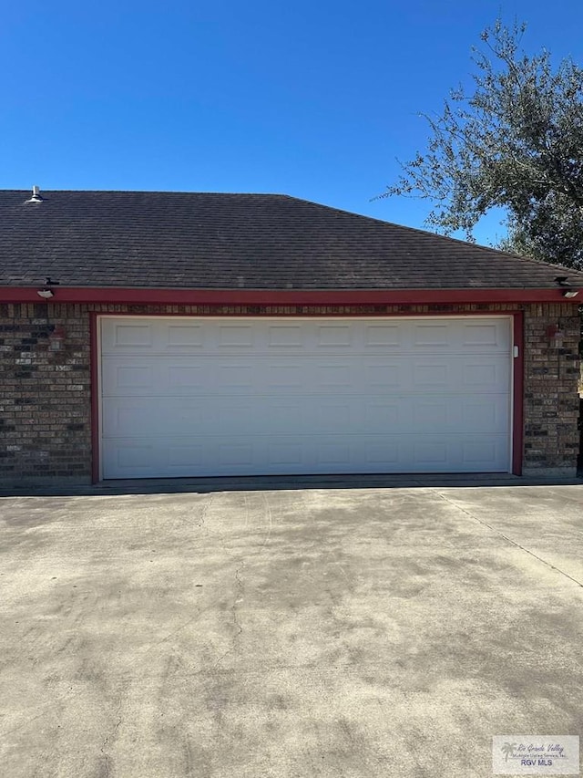 garage with driveway