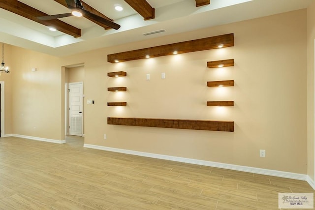 interior space featuring visible vents and a ceiling fan