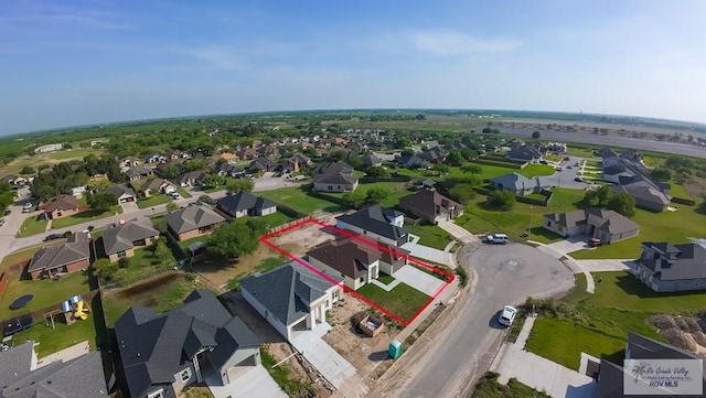 drone / aerial view with a residential view