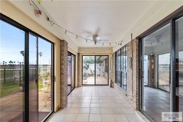 22 Shenandoah River Dr, Brownsville, TX 78520 - unfurnished sunroom with a ceiling fan and tile patterned flooring