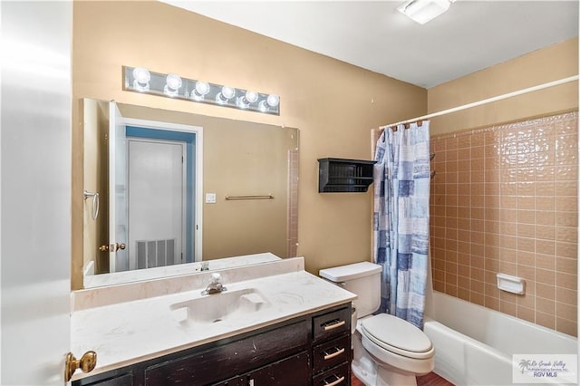 22 Shenandoah River Dr, Brownsville, TX 78520 - bathroom featuring toilet, shower / bath combo, and vanity