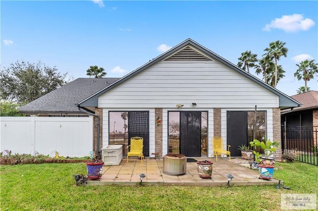 22 Shenandoah River Dr, Brownsville, TX 78520 - rear view of house with a patio area and a shingled roof