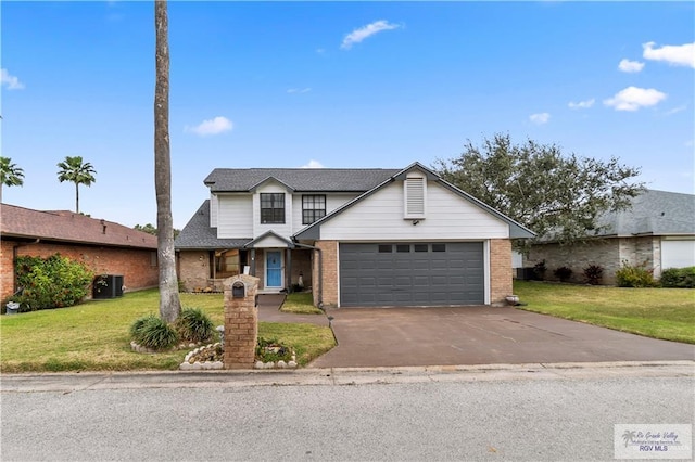 22 Shenandoah River Dr, Brownsville, TX 78520 - traditional-style home with a front lawn, driveway, a garage, and brick siding