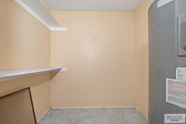 3673 Rey Enrique Dr, Brownsville, TX 78521 - walk in closet featuring water heater