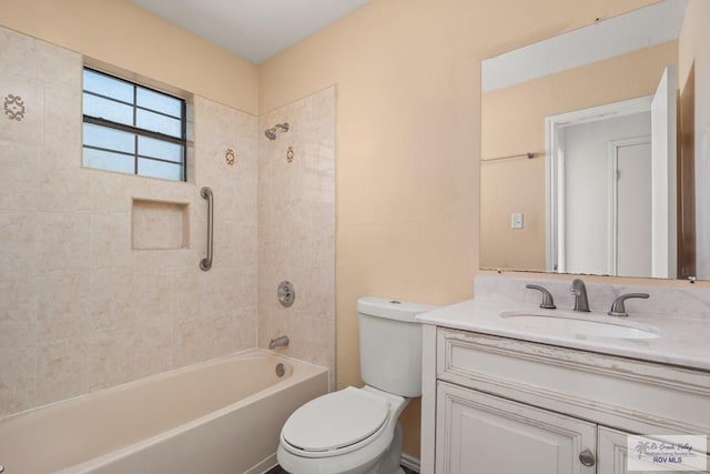 3673 Rey Enrique Dr, Brownsville, TX 78521 - bathroom with toilet, vanity, and shower / bath combination