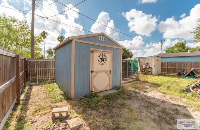 818 S 18th St, Alamo, TX 78516 - view of shed with a fenced backyard