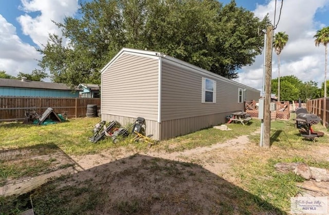 818 S 18th St, Alamo, TX 78516 - view of outbuilding featuring a fenced backyard