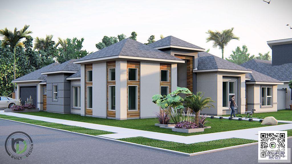 view of front of home with a garage and a front yard