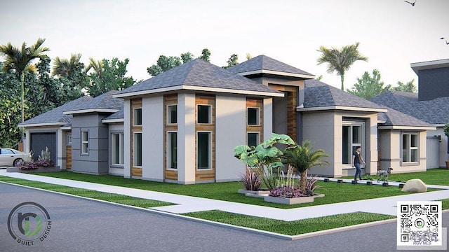 view of front facade featuring a front yard, an attached garage, and stucco siding