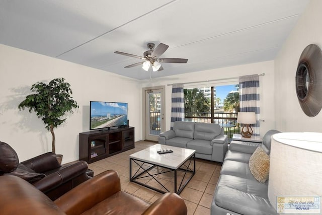 406 Padre Blvd Unit 207, South Padre Island, TX 78597 - living room with ceiling fan and light tile patterned flooring