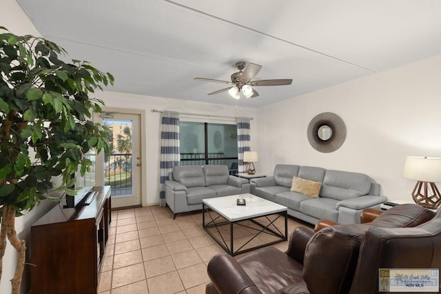 406 Padre Blvd Unit 207, South Padre Island, TX 78597 - living area with a ceiling fan and light tile patterned floors