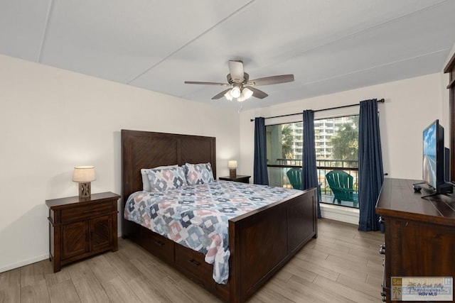 406 Padre Blvd Unit 207, South Padre Island, TX 78597 - bedroom with light wood-type flooring and a ceiling fan