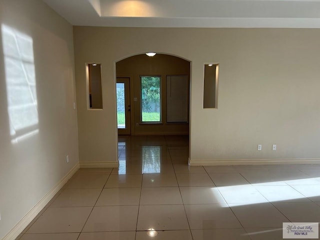 view of tiled spare room