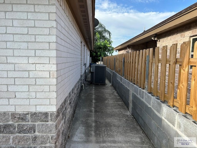 view of property exterior with central air condition unit