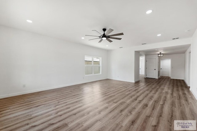 unfurnished living room with light hardwood / wood-style flooring and ceiling fan