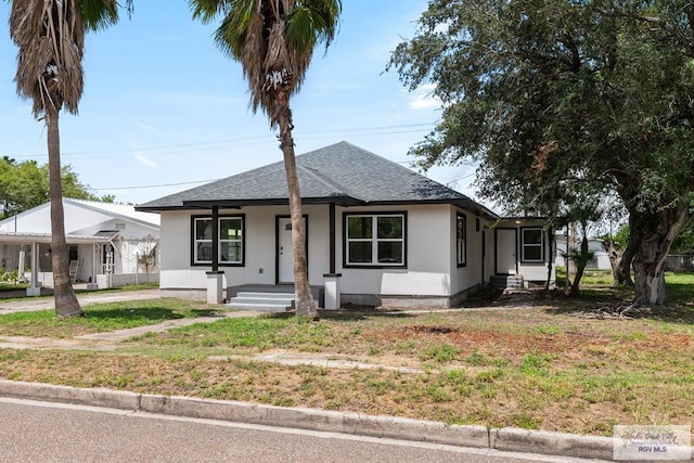 bungalow with a front yard