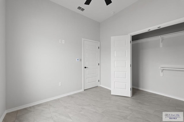 unfurnished bedroom with a closet and ceiling fan