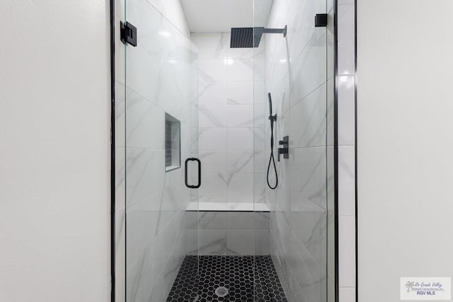 bathroom with walk in shower