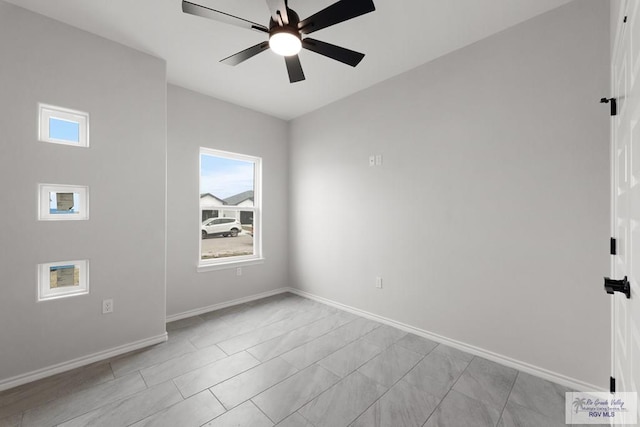 spare room featuring ceiling fan