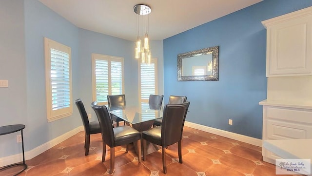 dining room with tile patterned floors