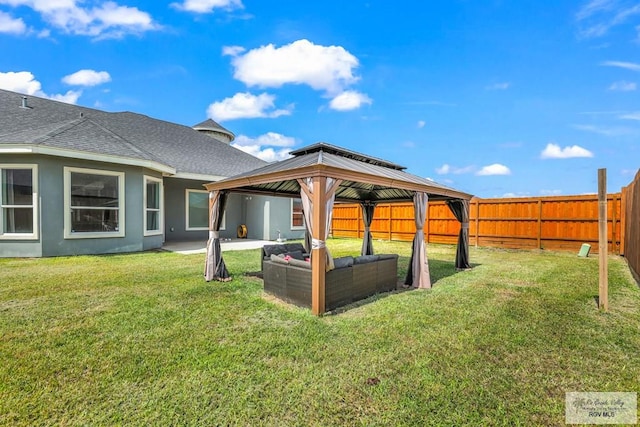 view of yard featuring a gazebo and outdoor lounge area