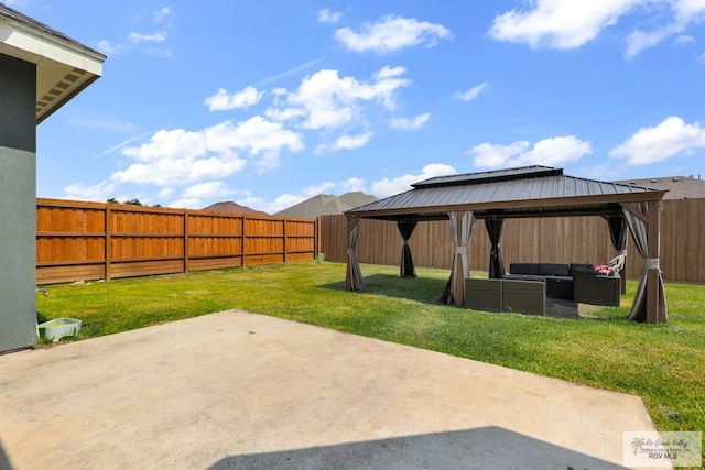 view of yard featuring a gazebo, a patio area, and an outdoor living space