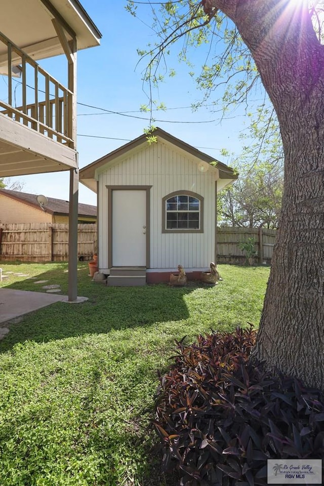 garage with fence