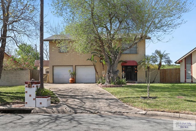 view of front facade with a front yard, fence, concrete driveway, a garage, and brick siding