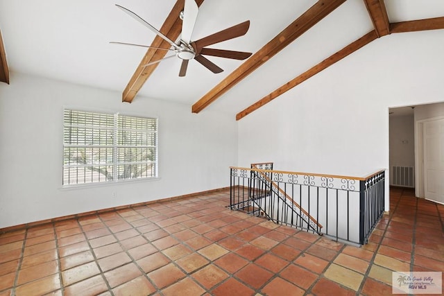 spare room with visible vents, beamed ceiling, high vaulted ceiling, a ceiling fan, and tile patterned flooring