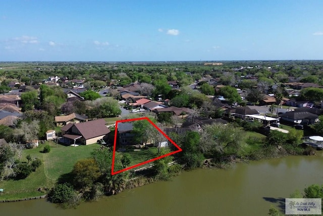 birds eye view of property with a residential view and a water view