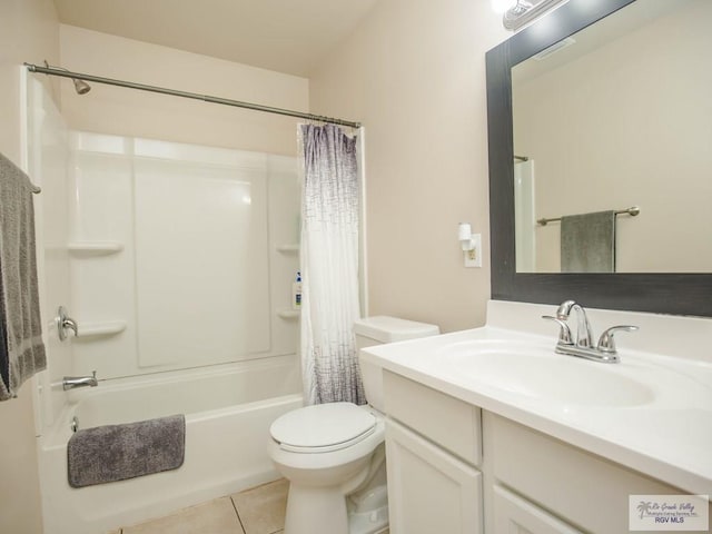 full bathroom featuring tile patterned flooring, vanity, shower / bath combination with curtain, and toilet