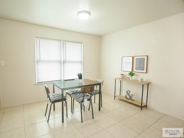 dining room featuring light tile patterned floors