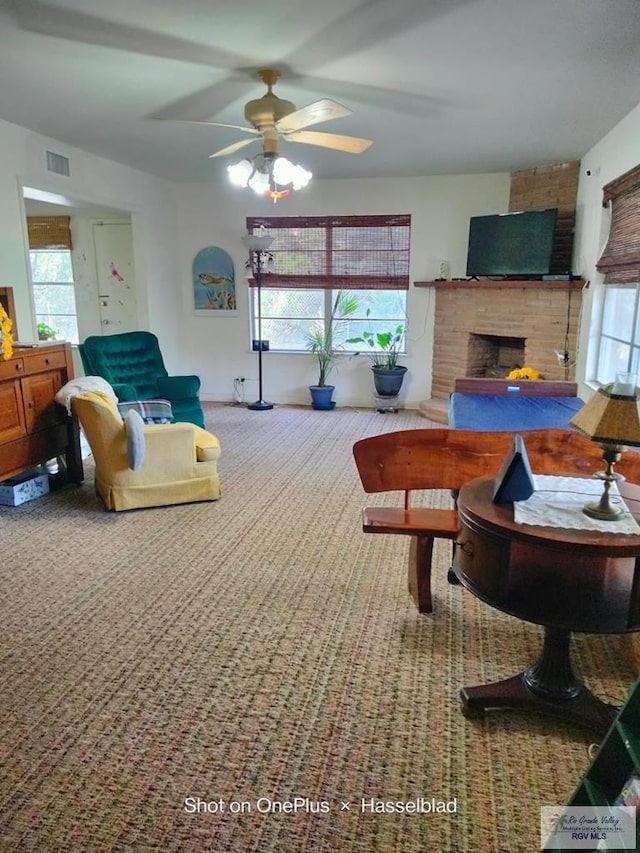 living room with wood finished floors and plenty of natural light