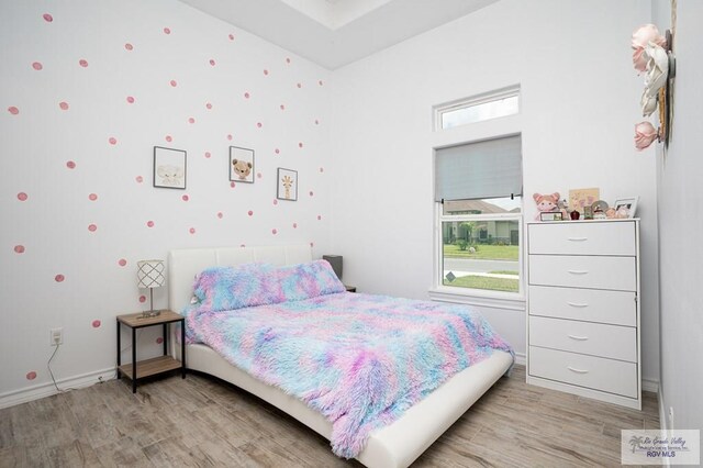 bedroom featuring light hardwood / wood-style flooring